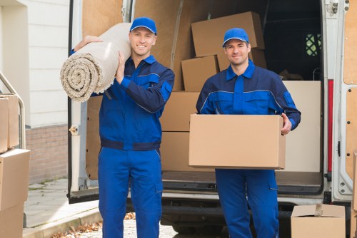 Professional packers from Abby Movers carefully packing household items