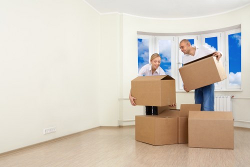 Professional movers handling furniture with care